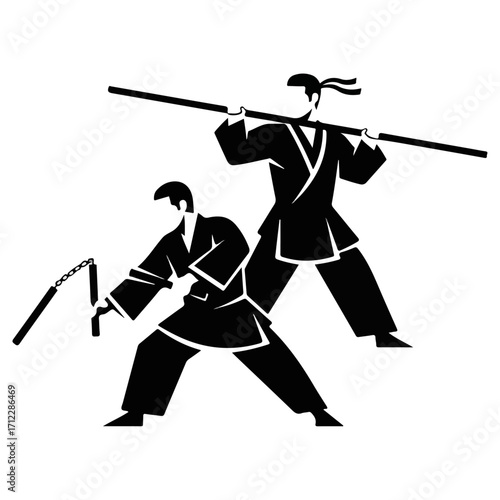 Martial Arts Training - Two Figures Practicing Weaponry Skills.