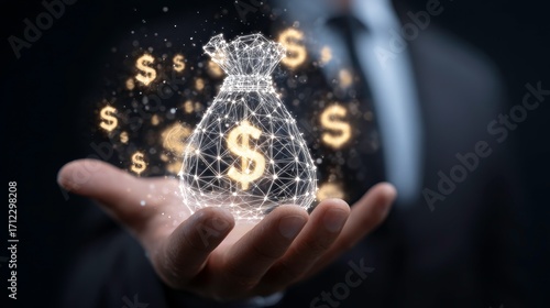 Hand Holding Money Bag with Dollar Sign Symbols Glowing in Dark