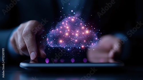Glowing purple cloud with sparkles floating above digital tablet screen while person works in dark room, concept of cloud computing and digital technology.