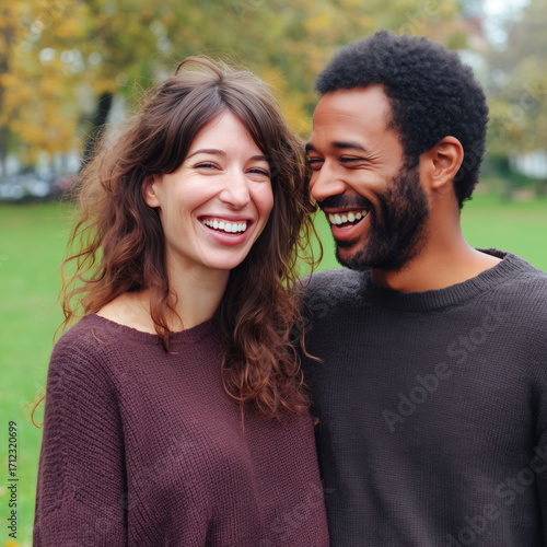 A joyful, diverse couple in...