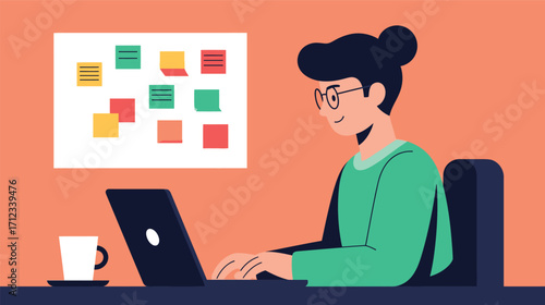 Person working on laptop, focused on task