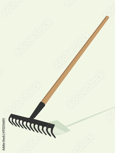 Illustration of a rake with a wooden handle and black tines, casting a shadow on a light background.
