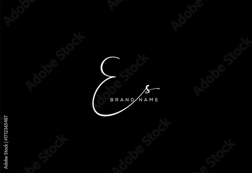ES letter beauty cursive handwriting logo.