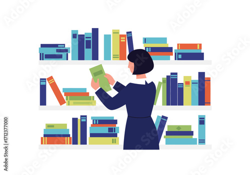 Woman in blue dress selects book from shelf