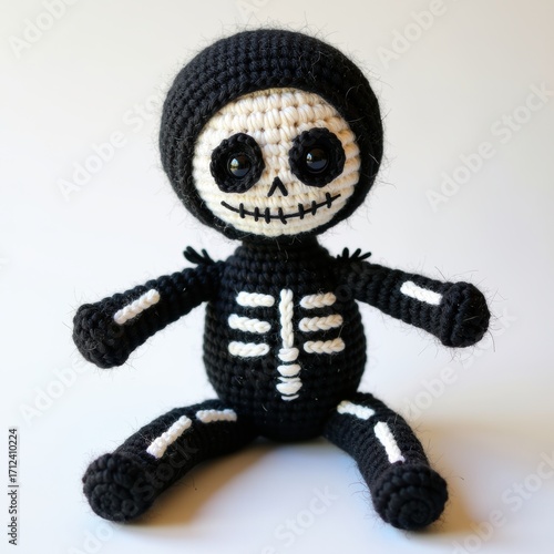 Little skeleton knitting with black yarn