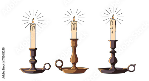 Three antique brass candlesticks with lit candles glowing warmly and casting light.