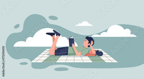 A Young Person Is Relaxing Outdoors Reading A Book On A Blanket Under A Sky