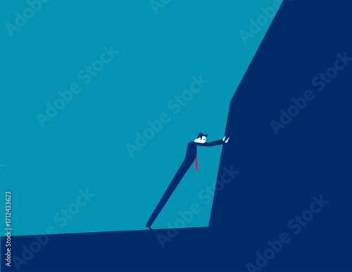 Businessman trying to move mountains