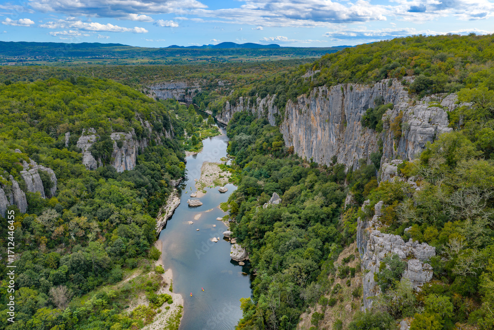 Fototapeta premium The Ardèche River Flowing Through the Dramatic Gorges de l'Ardèche