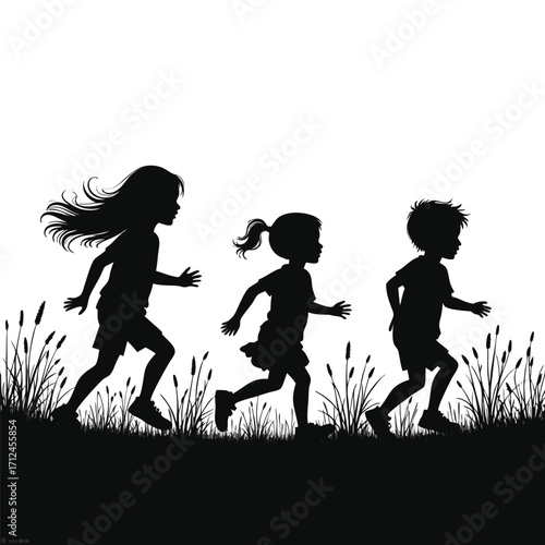 Three children silhouettes running through grass and reeds
