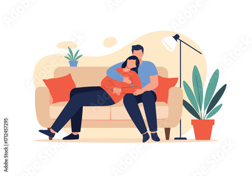 A couple enjoys a cozy moment together on the sofa.