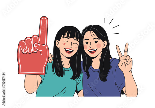 Two happy young women friends celebrating together on a white background.