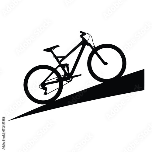 Silhouette mountain bike ascending steep incline extreme sports adventure graphic silhouette