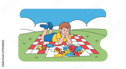 Boy Completes Puzzle Outdoors While Relaxing on Picnic Blanket on a Sunny Day