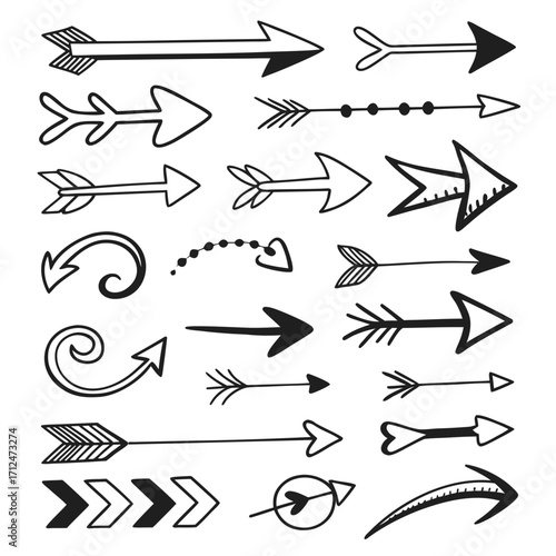 Collection of hand drawn doodle arrows and swirls in black and white sketch style