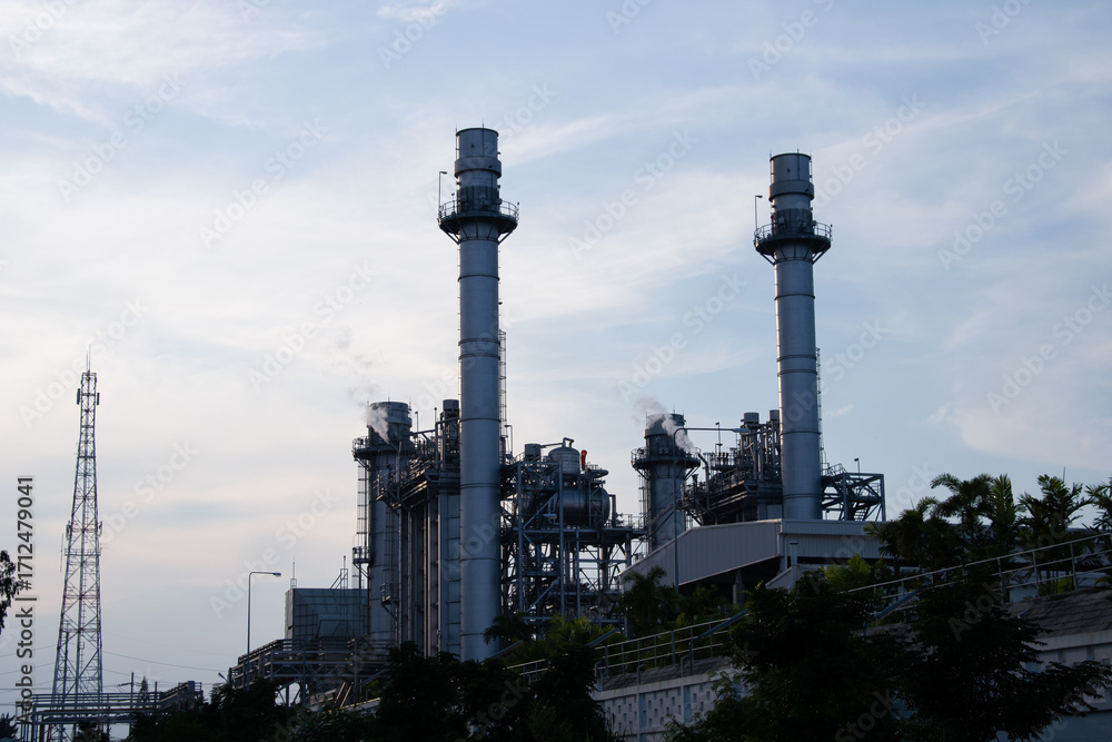 Obraz premium Natural Gas Combined Cycle Power Plant ,Gas turbine electrical power plant with in Twilight power for factory energy concept.