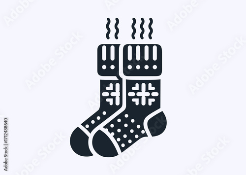 Self-knitted woolen winter socks are drying