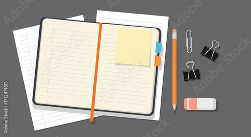Open Notebook With Stationery Supplies on a Desk.