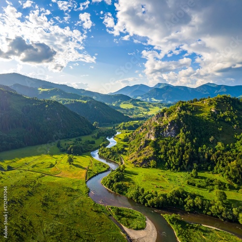 Drone view of mountains with winding river