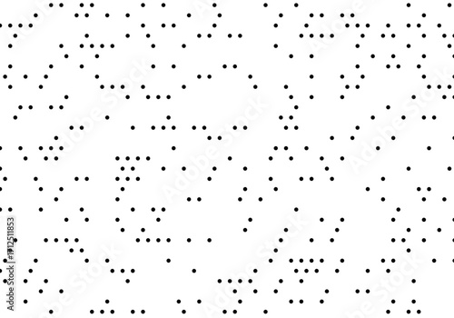 Abstract pattern of scattered dark dots on a white background, representing data or noise