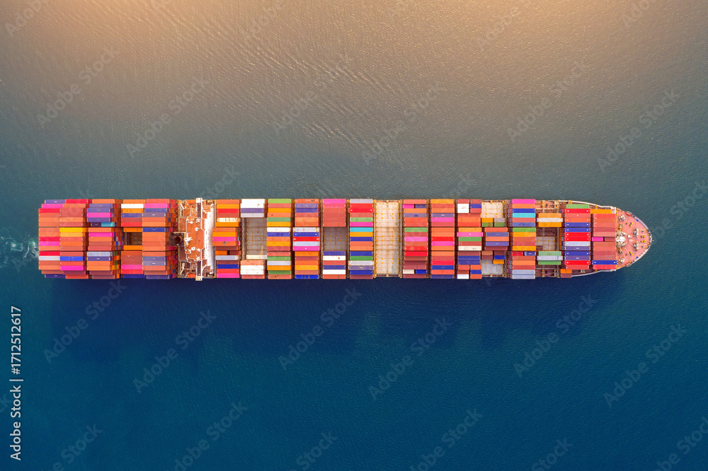 Fototapeta premium Aerial view of container cargo ship in sea.