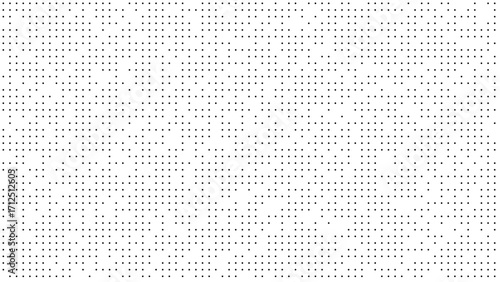 Abstract digital pattern of gray dots on white background, representing data or code