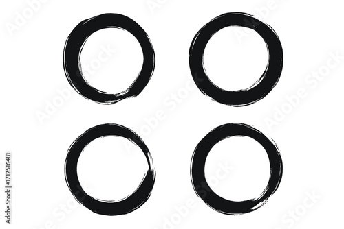 Set of black grunge brush stroke circles. Hand-drawn round frames with a distressed texture. Vector ink wash Zen Enso symbol for design. Abstract scribble circular shapes.