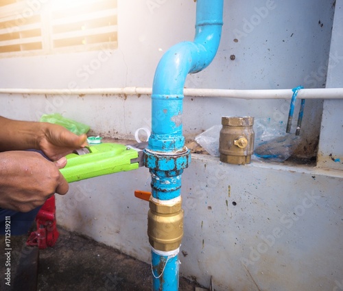 Repair and service gate valve on the pipe line water treatment in industri. Service and repair plumbing concept.