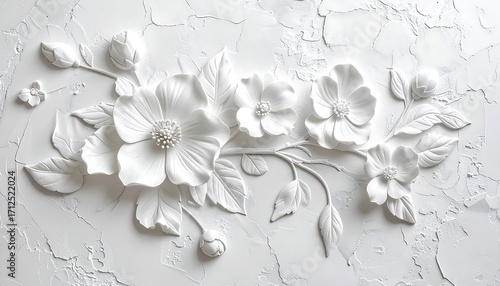 Ornate white floral relief on textured surface