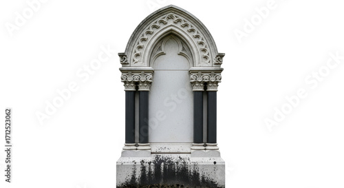 Fotografie Isolated ornate stone monument with architectural arch and column detail on neut