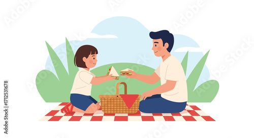 Father And Daughter Sharing Sandwiches During A Picnic Enjoying Leisure Time Together