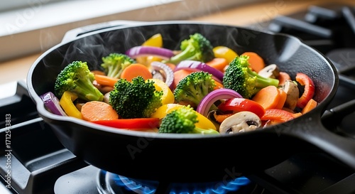 Fototapeta Naklejka Na Ścianę i Meble -  Colorful Vegetable Stir Fry in Cast Iron Pan.