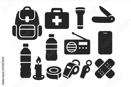 Emergency kit essentials icon set. Survival gear for disaster preparedness. Black silhouette vector illustration of a bug out bag, first aid, water, and other items.