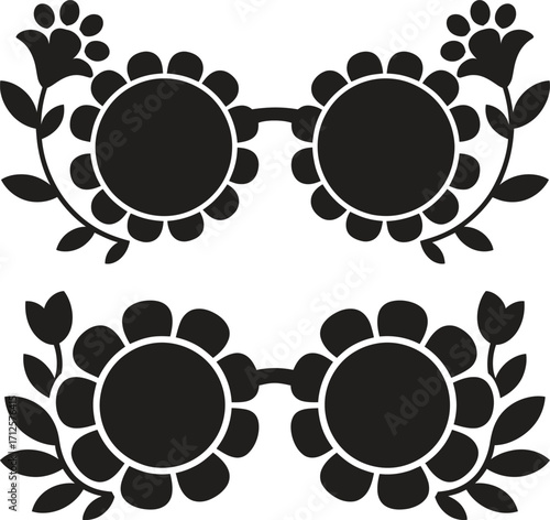 Two pairs of stylized black sunglasses adorned with floral and leaf designs