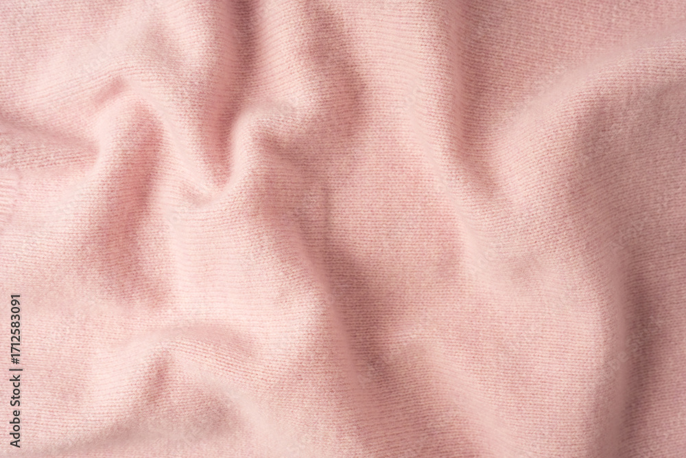 Fototapeta premium Soft pink cashmere sweater texture background.