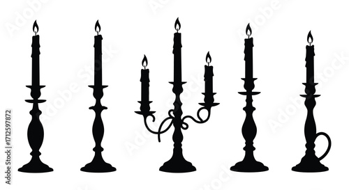 Elegant black candlestick arrangement displaying a striking dark silhouette
