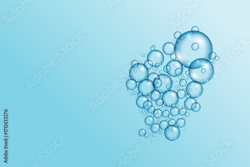 Realistic soap bubbles isolated on light blue background. Set of soap bubbles with rainbow reflection.
Abstract floating soap bubbles. Water drop,