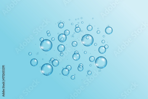 Realistic soap bubbles isolated on light blue background. Set of soap bubbles with rainbow reflection.
Abstract floating soap bubbles. Water drop,