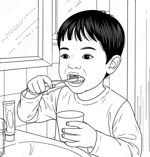 A young boy is brushing his teeth in the bathroom, holding a cup in his other hand.