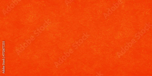 Grunge vintage orange paper texture with a blank aged canvas surface. Abstract creative and decorative grunge blurred yellow or orange background. Pale painted decorative and blurry abstract orange 