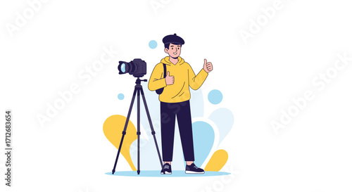 Young man filming with a professional camera on a tripod.