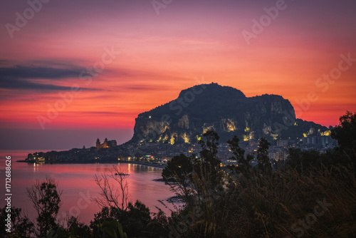 Cefalu, medieval city of Sicily island, Province of Palermo, Italy. Panoramic pre-sunrise view, August 2024