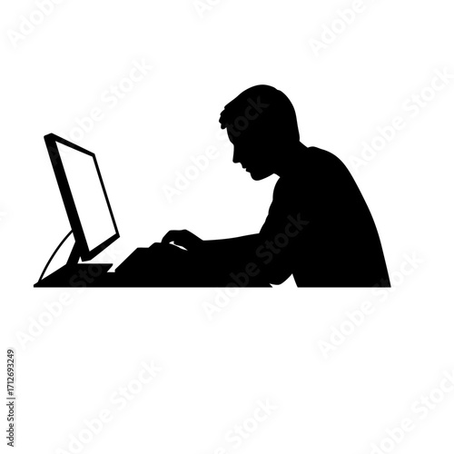 Silhouette of a man focused on his computer screen working diligently at his desk isolated on white background