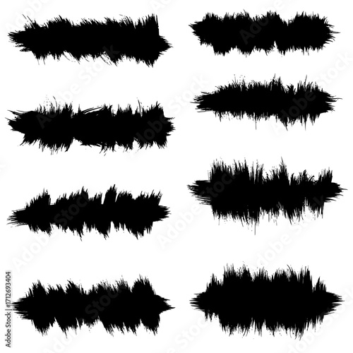 Collection of eight black grunge brush stroke elements for graphic design projects isolated on white background