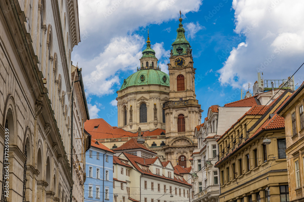 Obraz premium Prague cityscape, the capital of Czech Republic tourist sights. Prague historic center district at Charles bridge during the day. Busy tourist area city sights of Prague, capital of Czech