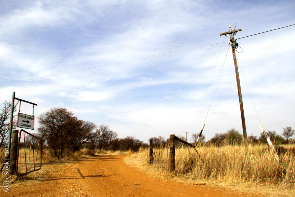 Fototapeta premium Photo of a farm gate with the farm name on the way to Krugerskraal. Paul Kruger's parents' farm and where Totius lived in seclusion to translate the Bible