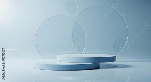 Minimalist display podiums with abstract glass circles on a light blue background
