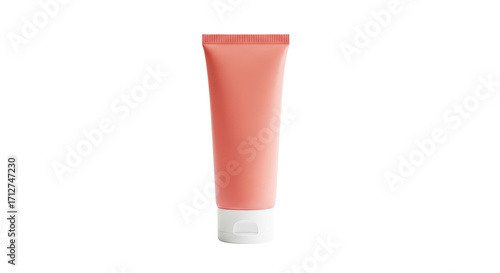 Isolated cream tube in pastel peach color for skincare or beauty on minimal background