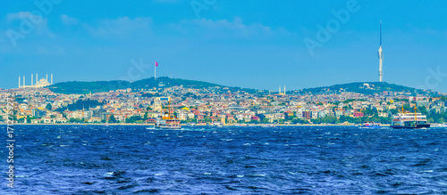 Photography Beautiful panoramic view of the Asian part of Istanbul, the Uskudar district across the Bosphorus with a view of the TV telecommunications tower