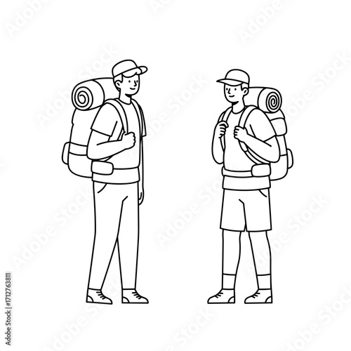 Two young men talking while wearing backpacks and outdoor clothing  